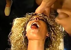 Curly Blonde Slut eats cum